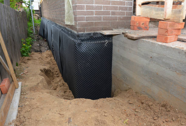 Happy homeowners after waterproofing job in Lake Bluff